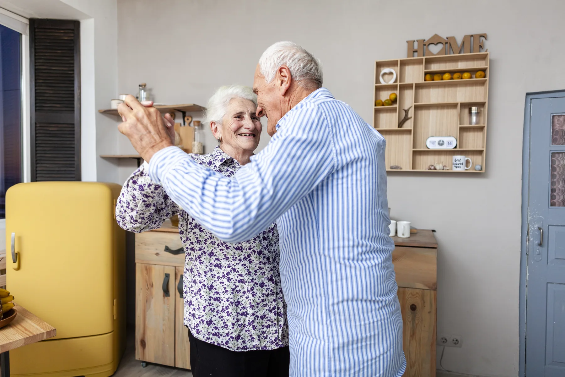 CasaMia specialist helping plan home improvements in a kitchen